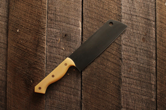 Acid etched Oak and anvil chefs knife on wood